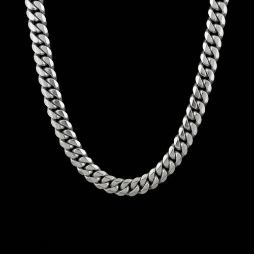 12mm Cuban link stainless steel chain necklace on a black background