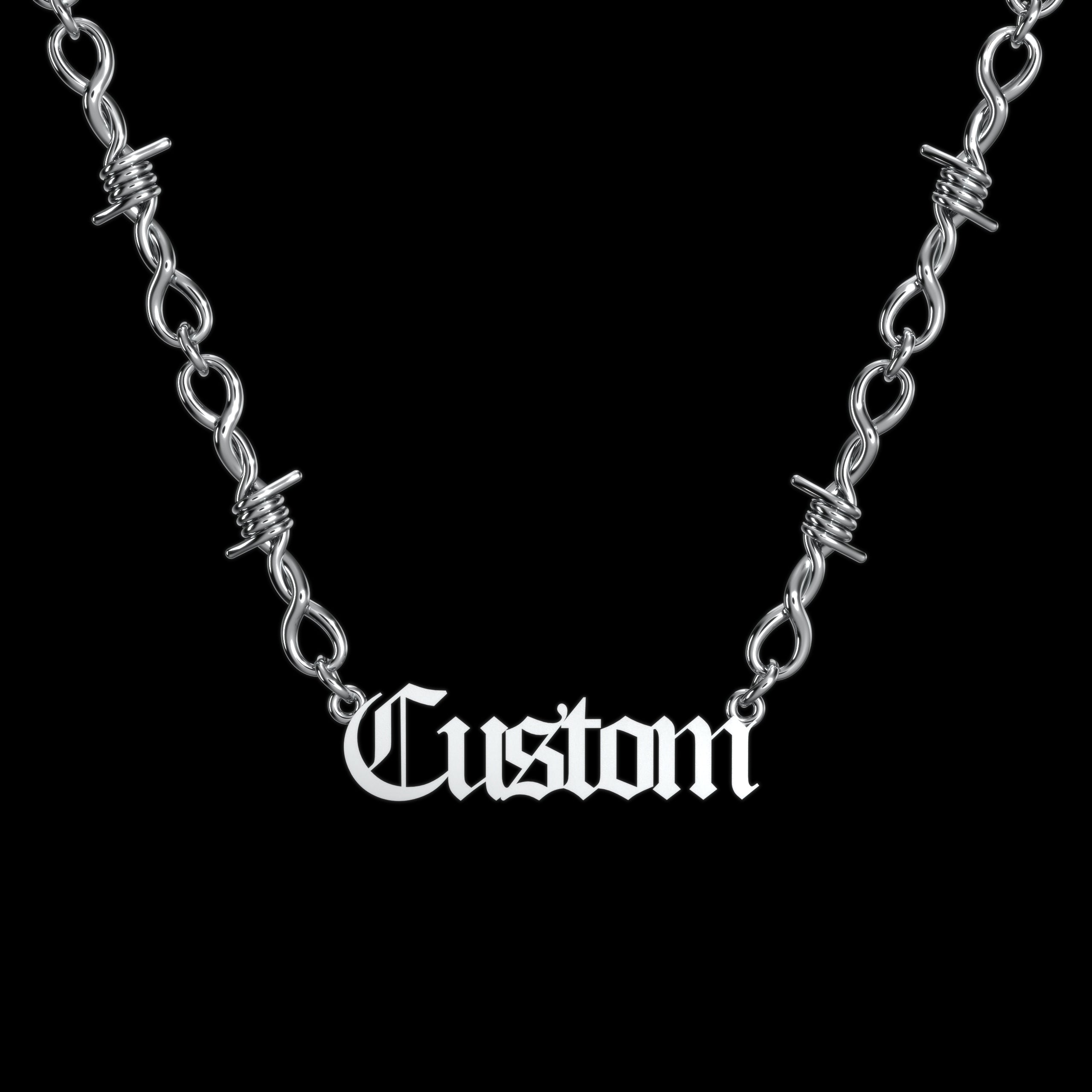 Custom barbed wire stainless steel name necklace on a black background