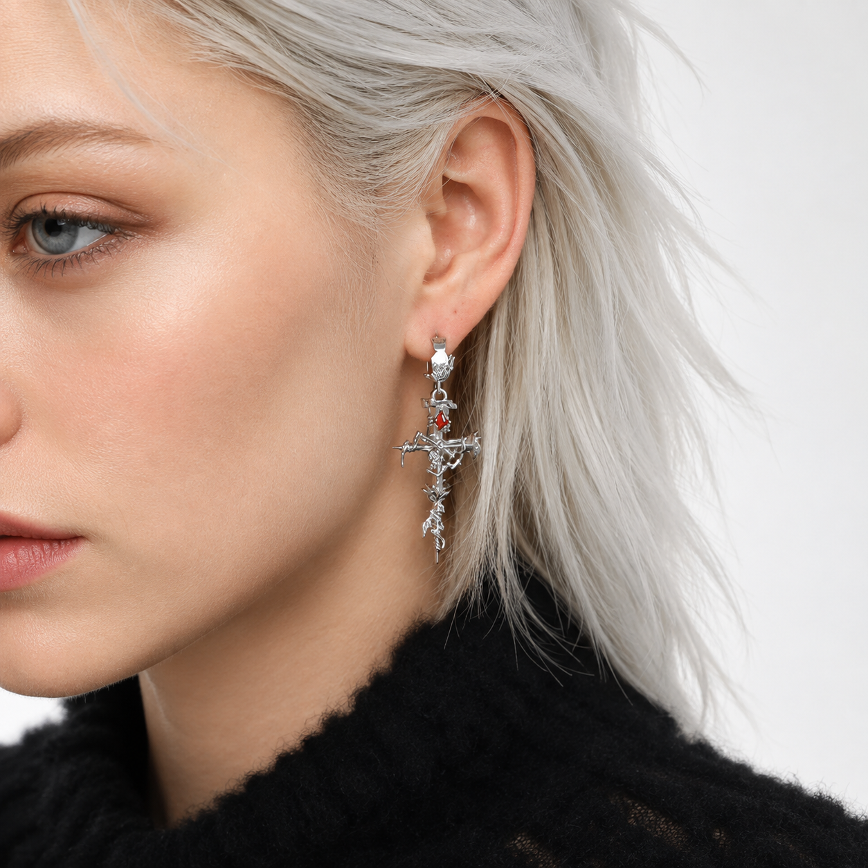 Thorned Rose Gothic Cross Earrings with red cubic zirconia – detail view