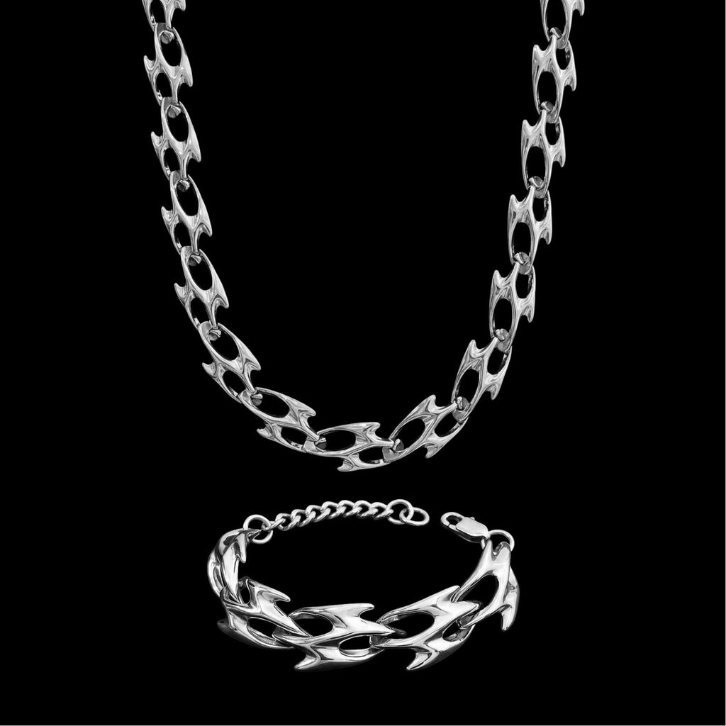 Fury stainless steel jewelry set on a black background