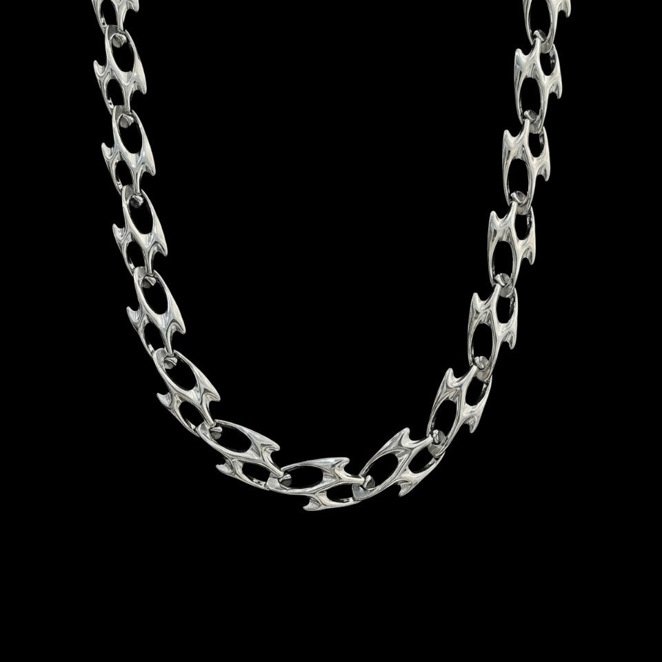 Fury stainless steel chain necklace on a black background