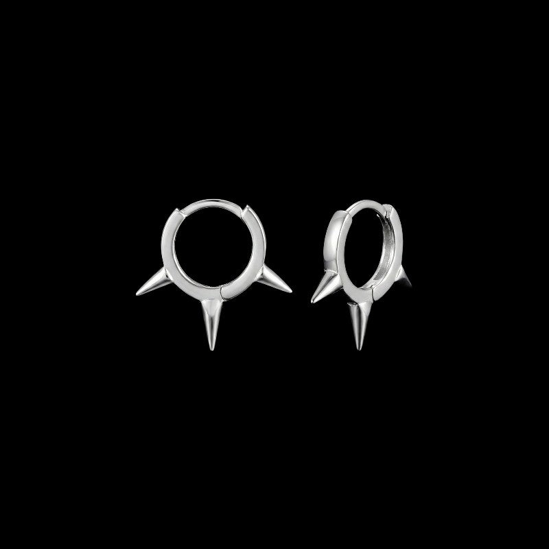 Pierce stainless steel hoop earrings on a black background