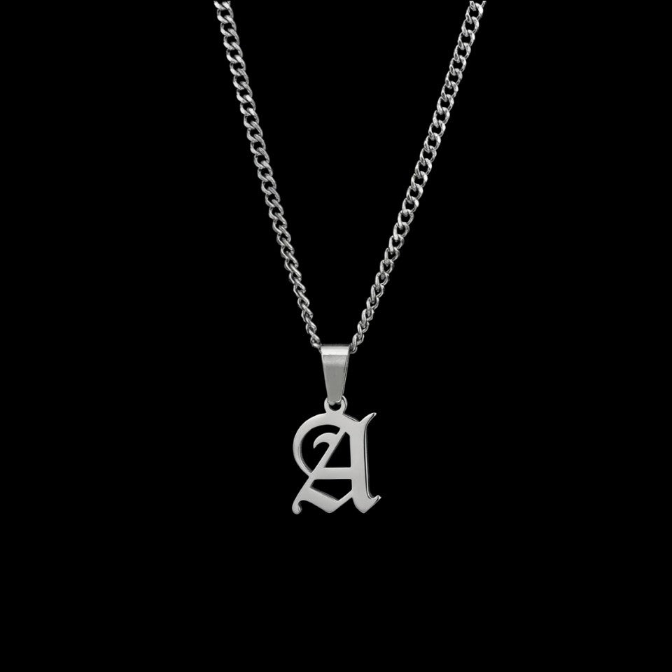 Custom gothic letter stainless steel necklace on a black background