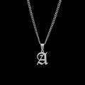 Custom gothic letter stainless steel necklace on a black background