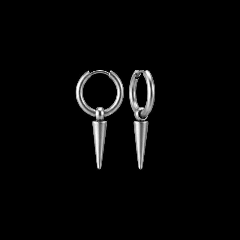Puncture spiked stainless steel hoop earrings on a black background