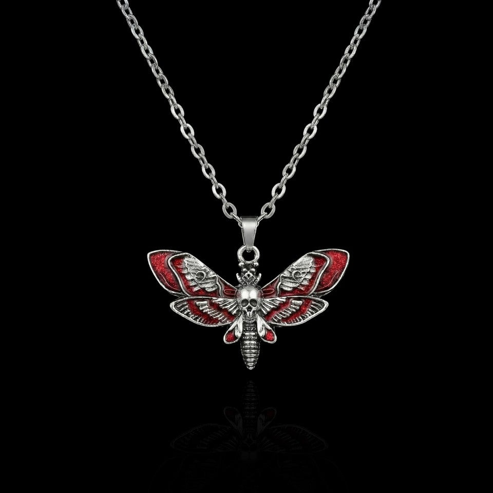 Blood moth gothic necklace with skull detail on a black background