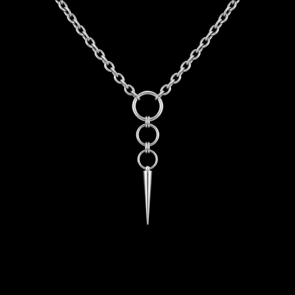 Spiked hoop stainless steel earrings on a black background