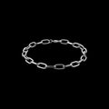 Chain-link stainless steel bracelet on a black background