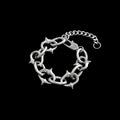 Berserk stainless steel bracelet on a black background