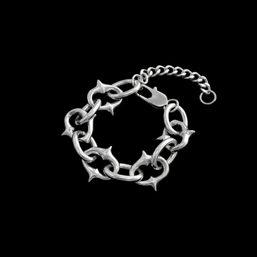Berserk stainless steel bracelet on a black background