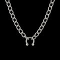 Riot stainless steel choker on a black background