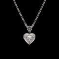Bat locket stainless steel necklace on a black background