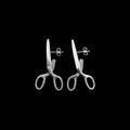 Scissor stainless steel earrings on a black background