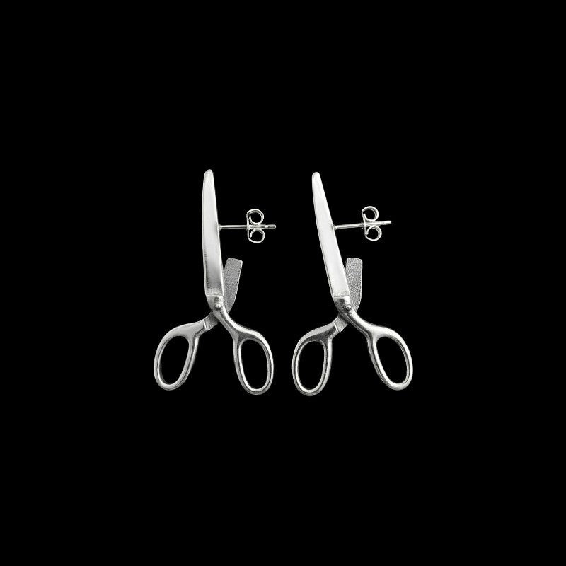 Scissor stainless steel earrings on a black background