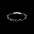 Chain-link stainless steel bracelet on a black background