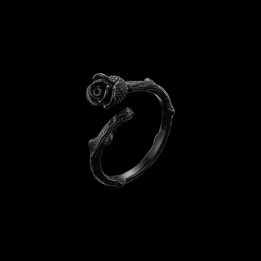 Thorn stainless steel ring on a black background
