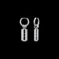 Razor blade stainless steel hoop earrings on a black background