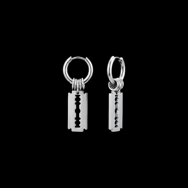 Razor blade stainless steel hoop earrings on a black background