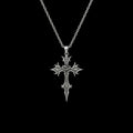 Crucible gothic stainless steel cross necklace on a black background