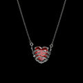 Dead Love red crystal heart necklace on a black background