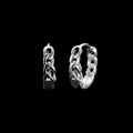 Chain stainless steel drop earrings on a black background
