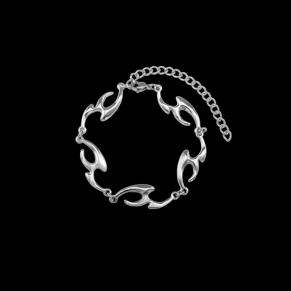 Lacerate stainless steel bracelet on a black background