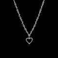 Barbed love stainless steel necklace on a black background