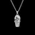 Coffin locket stainless steel necklace on a black background