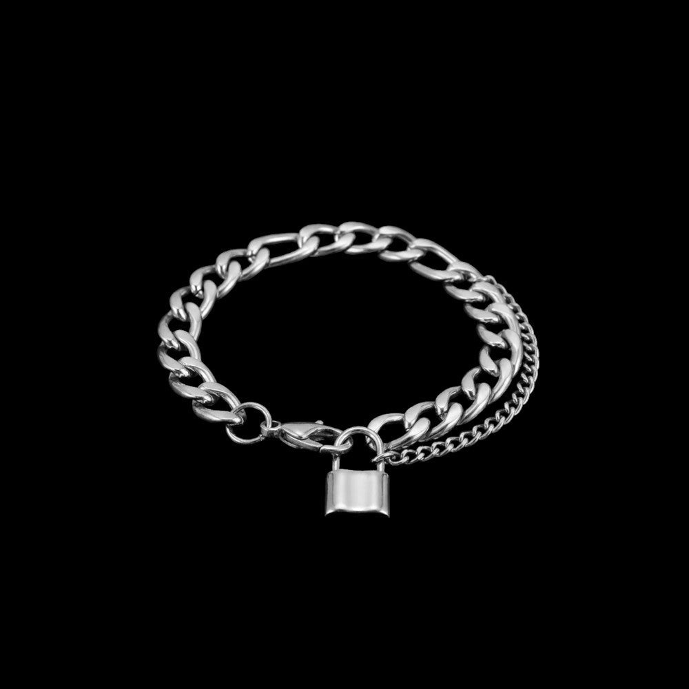 Locked stainless steel bracelet on a black background
