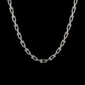 Rebel clasp stainless steel necklace on a black background