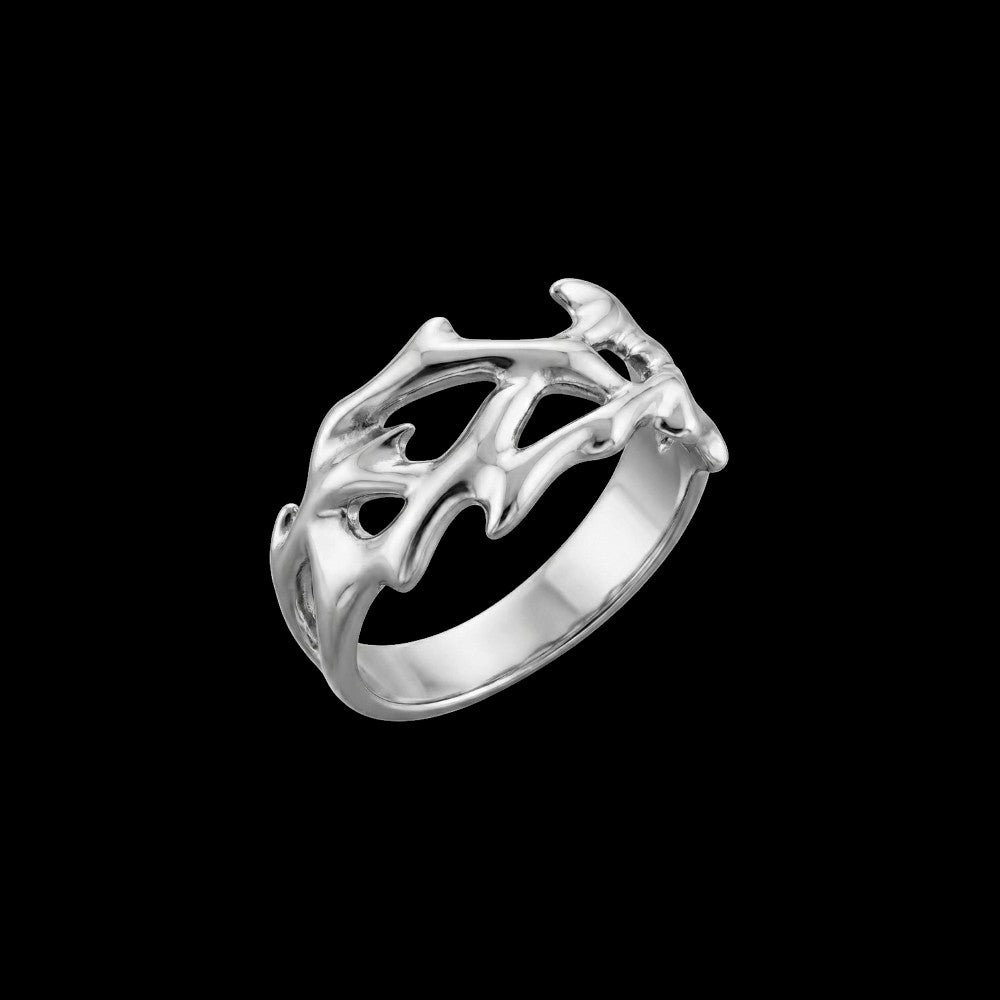 Fracture stainless steel ring on a black background
