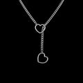 Heart slip stainless steel chain necklace on a black background