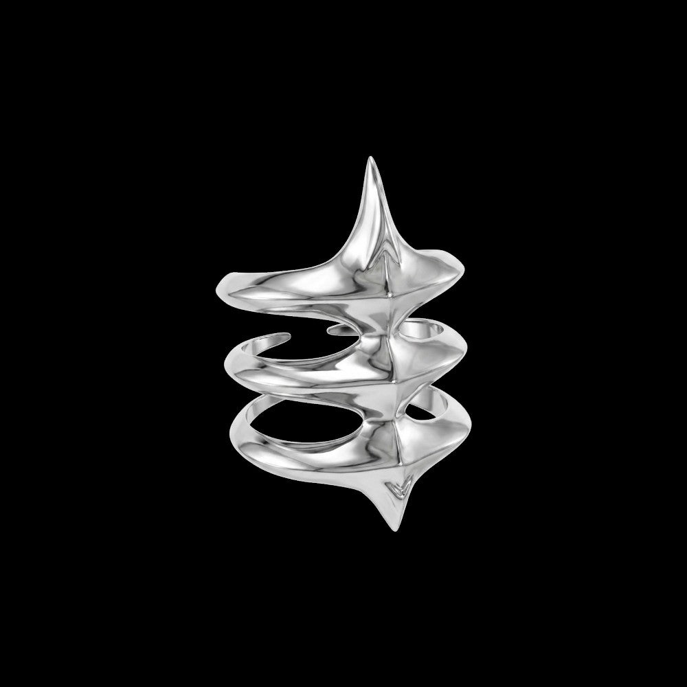 Exoskeleton spiked stainless steel ring on a black background