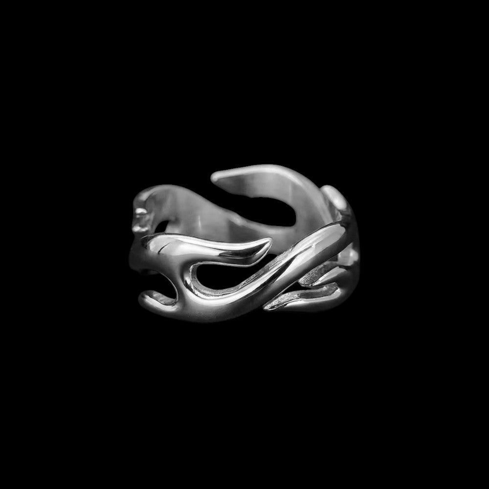 Scorch stainless steel ring on a black background