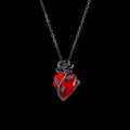 Blood rose red crystal necklace on a black background