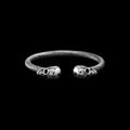 Mortal stainless steel skull bracelet on a black background