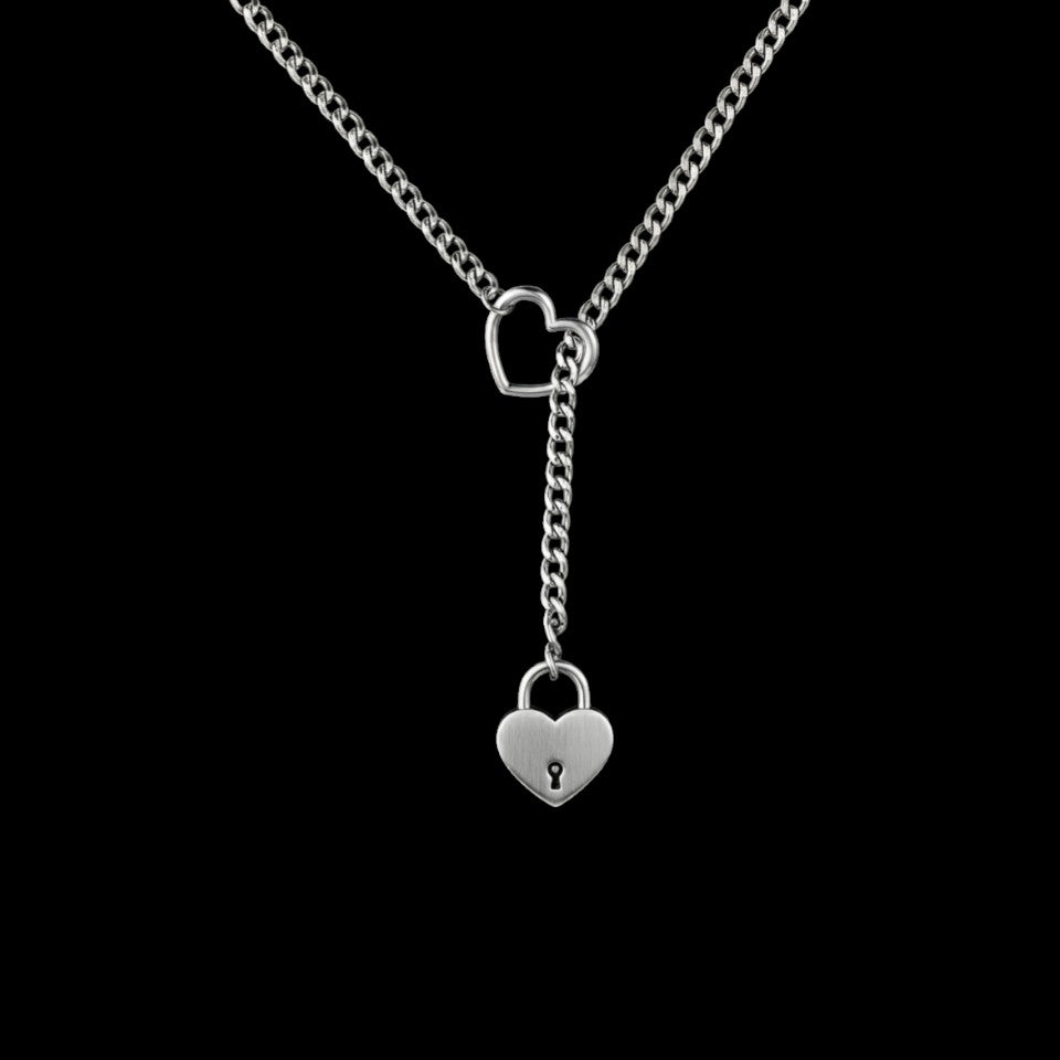 Lock slip stainless steel chain necklace on a black background