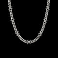 9mm barbed wire Cuban link stainless steel chain on a black background