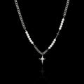 Resurrection gothic stainless steel necklace on a black background