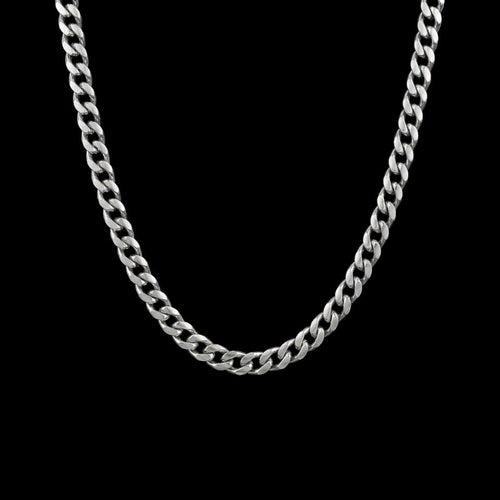 6mm Cuban link stainless steel chain necklace on a black background