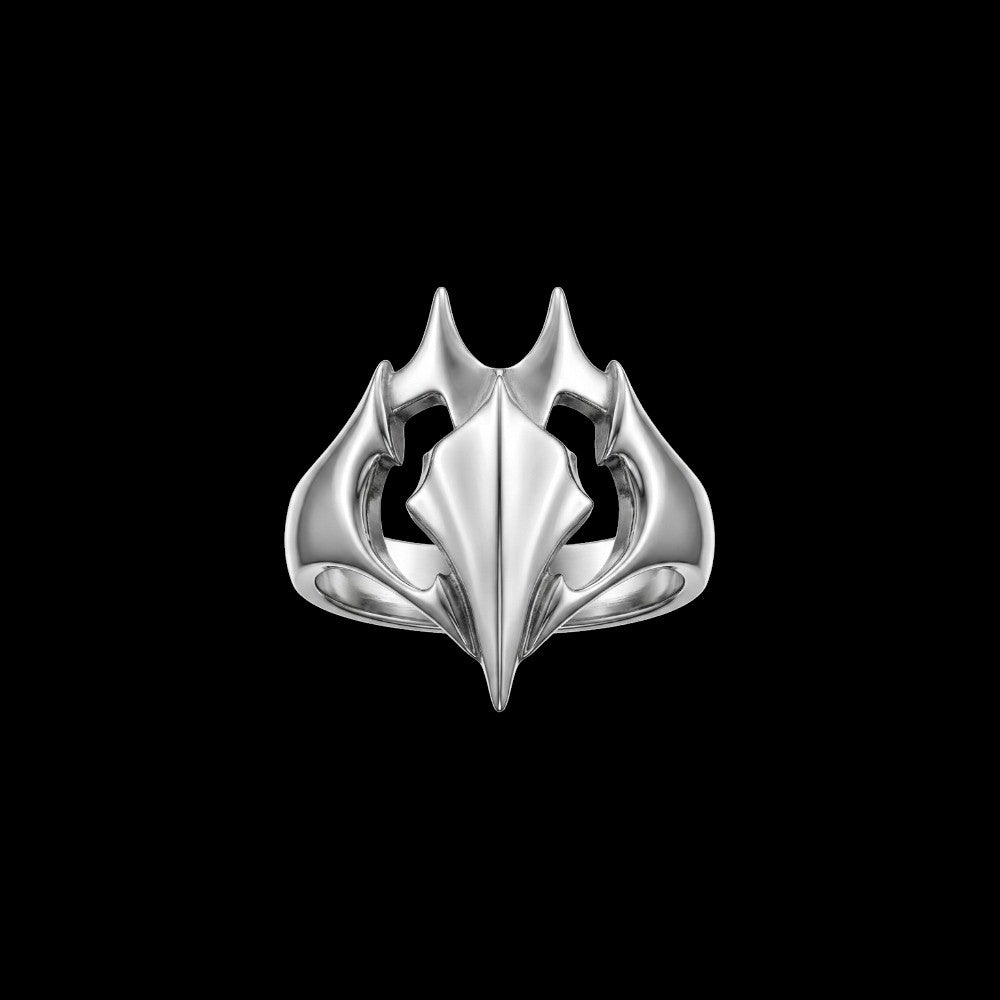Gash spiked stainless steel ring on a black background