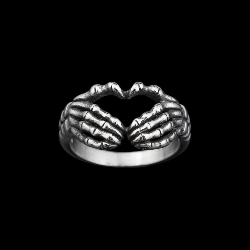 Death's Grip gothic stainless steel skull ring on a black background