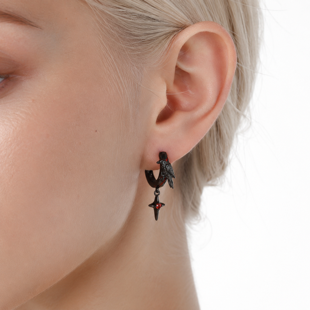 Raven Star Black Hoop Earrings with red star drops – detail view