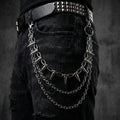 Spike stainless steel belt chain on a black background