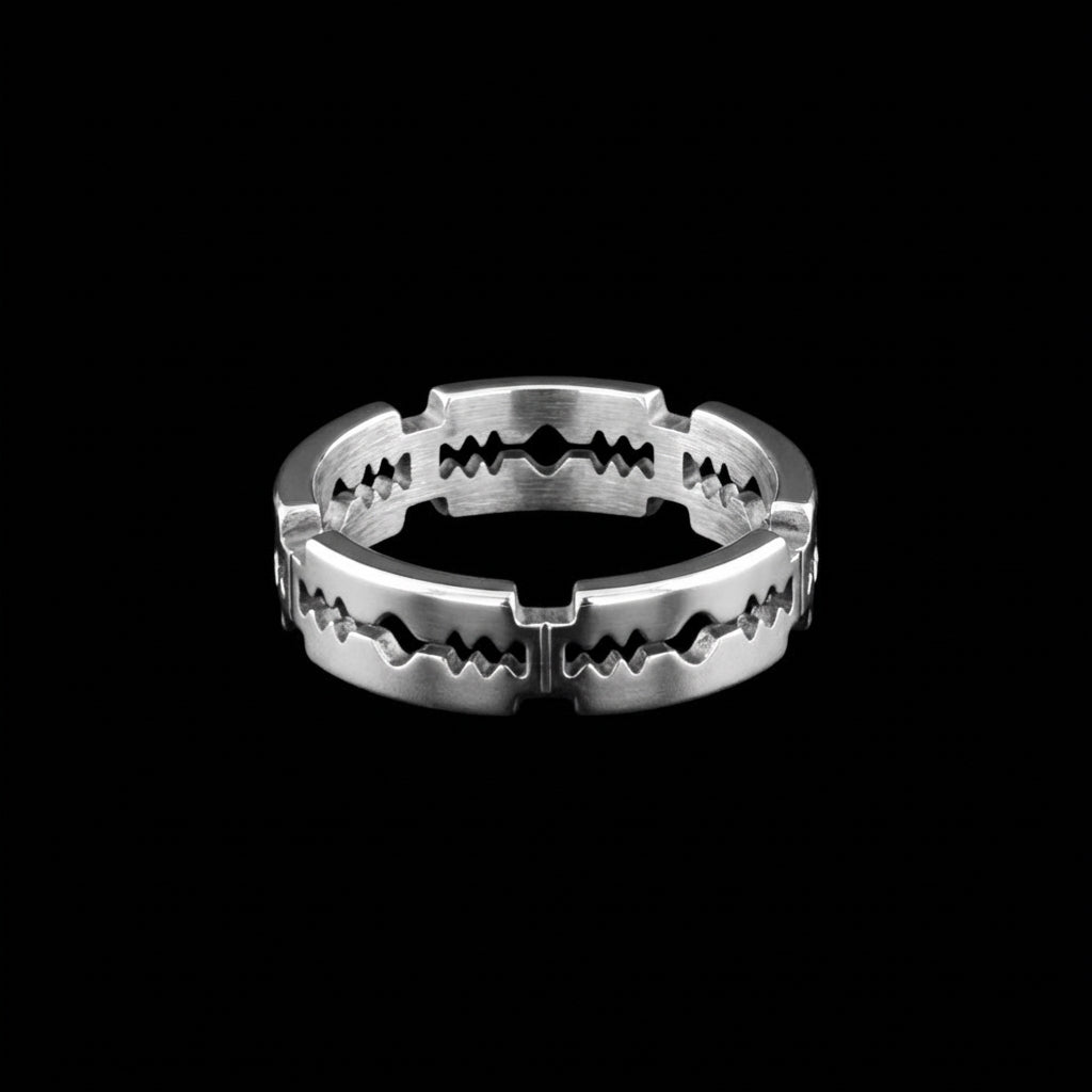 Razor stainless steel ring on a black background