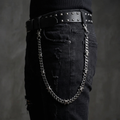 Barbed Cuban link stainless steel belt chain on a black background