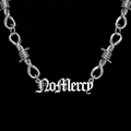 Custom barbed wire stainless steel name bracelet on a black background